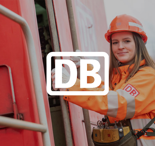 DB - woman in orange high vis jacket and hard hat