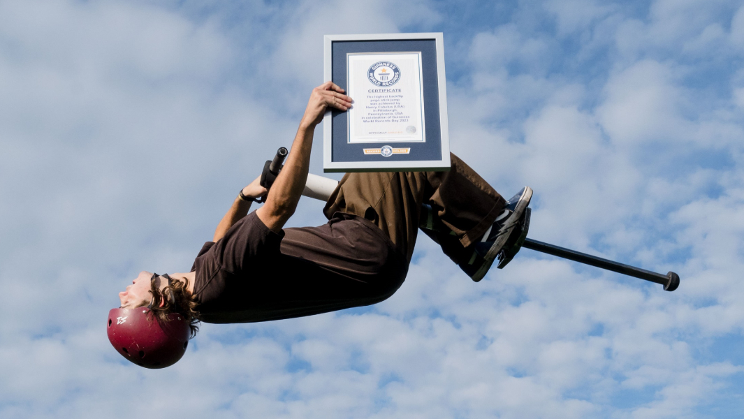 split-image-of-michael-mena-pogoing-and-henry-cabelus-backflipping-with-gwr-certificate.jpg