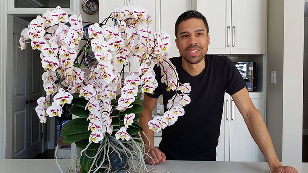 Kevin with his orchid