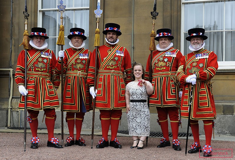 Ellie receiving an OBE in 2012