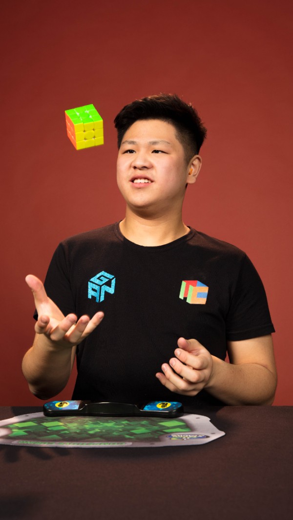 max park tossing a rubiks cube into the air