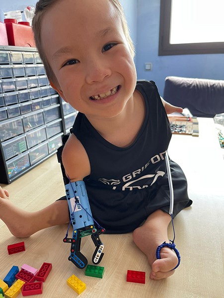 Beknur smiling and playing