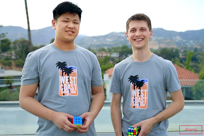 max park and feliks zemdegs smiling with rubiks cubes in hand