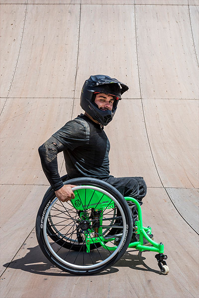 aaron on his wheelchair posing 