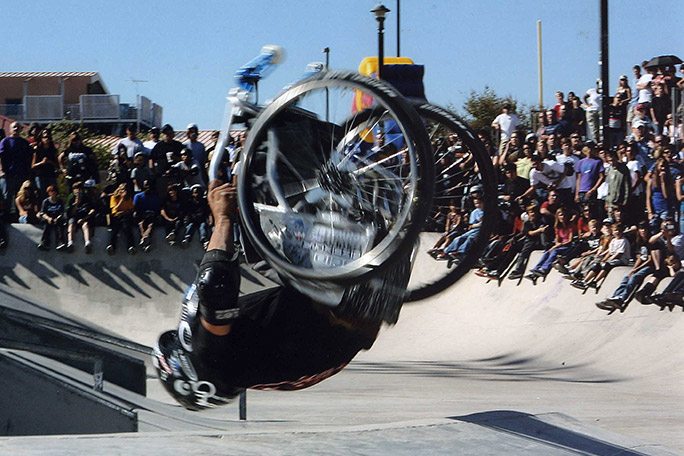 Aaron successfully lands the first wheelchair backflip under regulated conditions