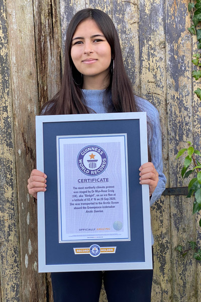Mya Rose holding gwr certificate