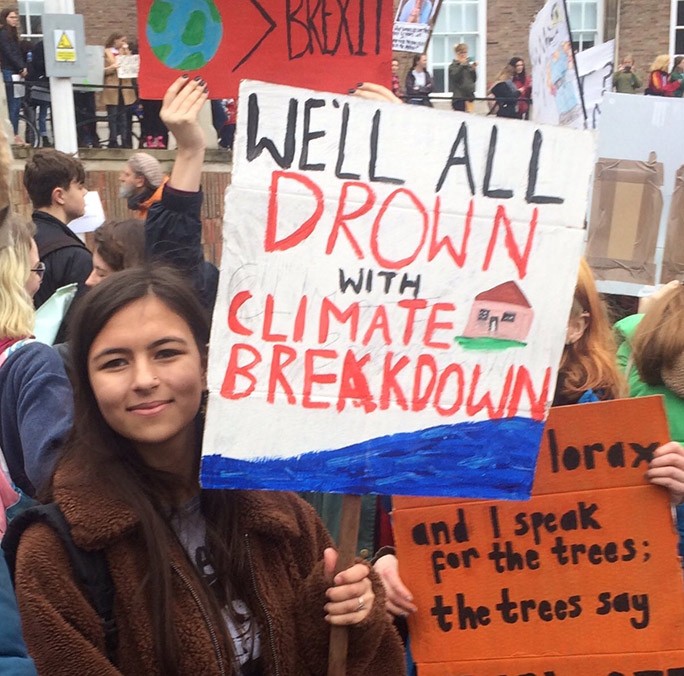 mya rose at a climate protest