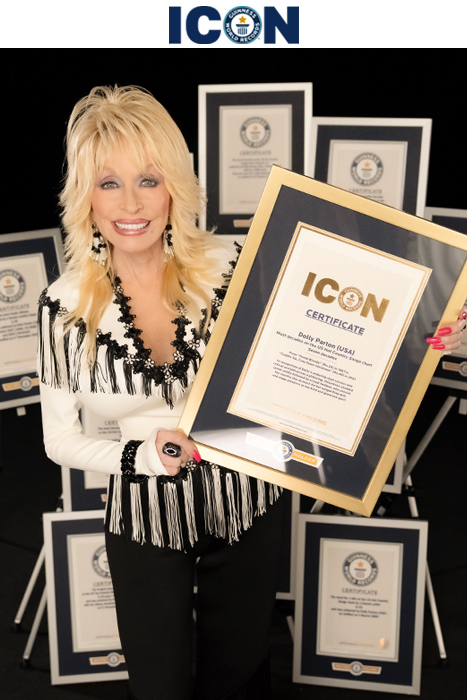 Dolly smiling with ICON certificate