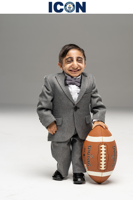 Shortest man living with logo